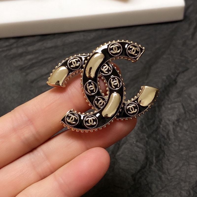 Ch**el brooches
